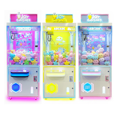 Three colorful Joy Catcher claw machines